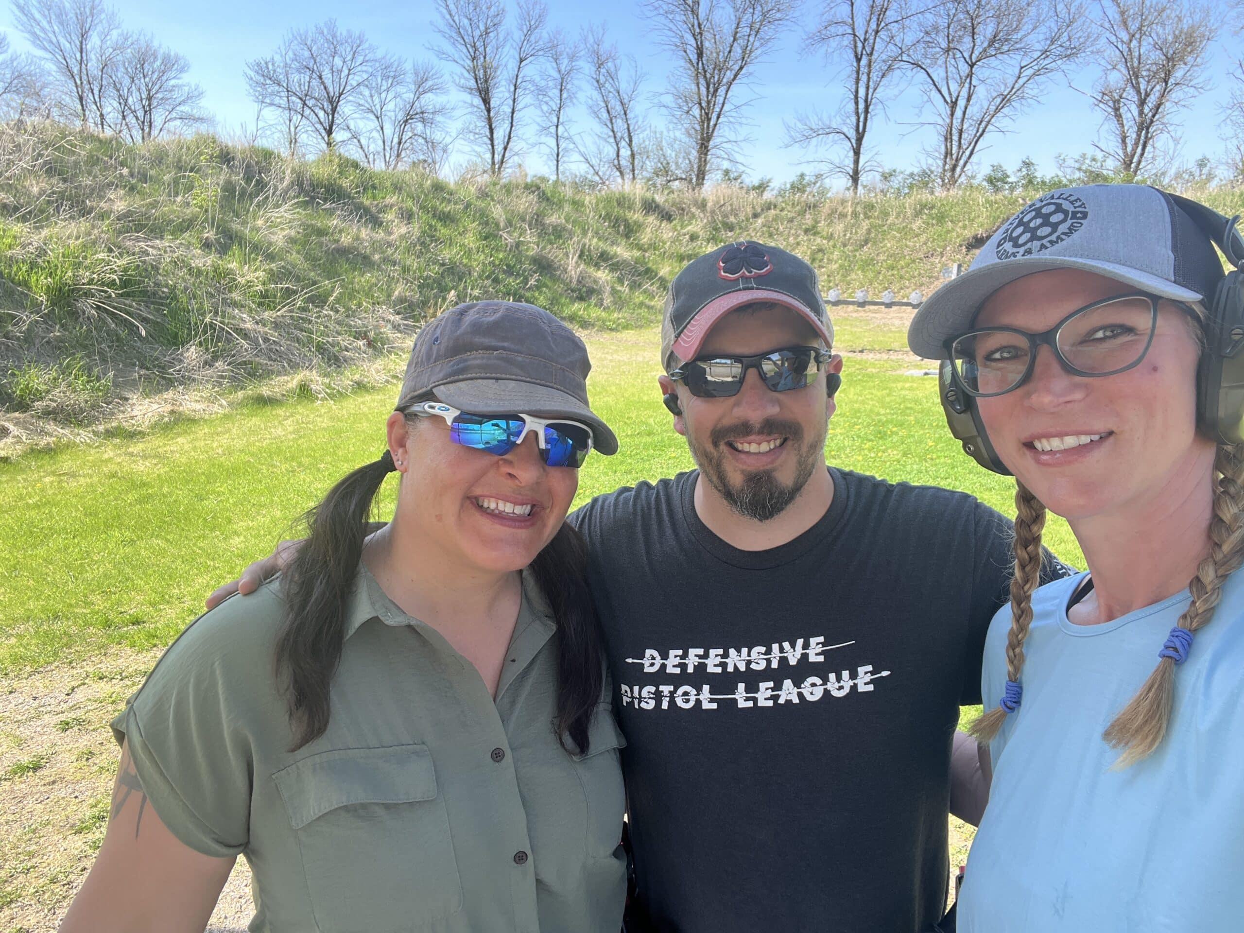Becky, Marcel and Heather of River Valley Arms & Ammo at the First Night of Defensive Pistol League 2025