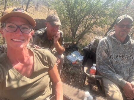 Hanging out in the blind at the watering hole. Warthog hunting is boring.