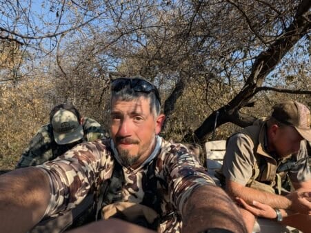 Hanging out in the blind at the watering hole. Warthog hunting is boring.